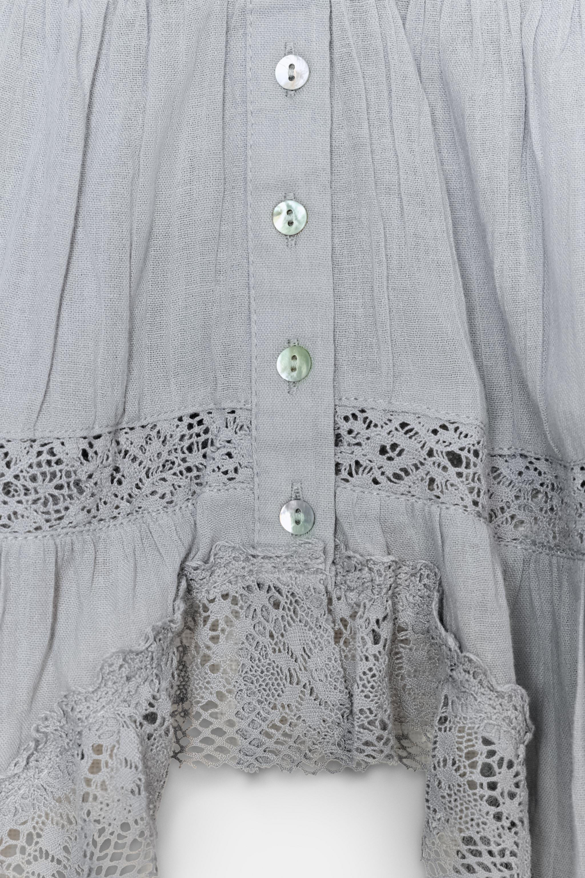 EMBROIDERED STRAP TOP